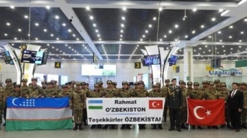 Hatay'da beyaban hastanesi kuran Özbek ekibi ülkesinde törenle karşılandı